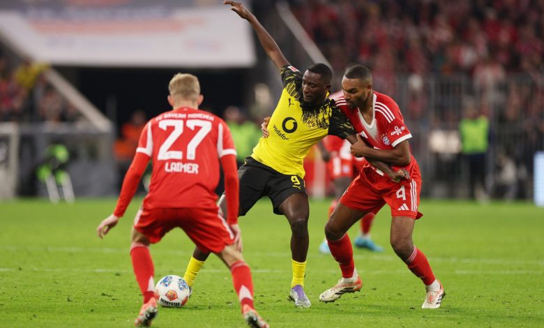 Fenerbahçe'de başkanlığı gelecek ay bırakacak Sadettin Saran, Borussia Dortmund'dan Serhou Guirassy ile el sıkıştı